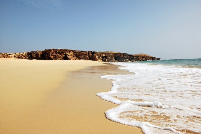 Half Day 4x4 Trip - Dunes, Caves, Santa Monica Beach & Village - Exploring the volcanic caves at Praia da Varandinha