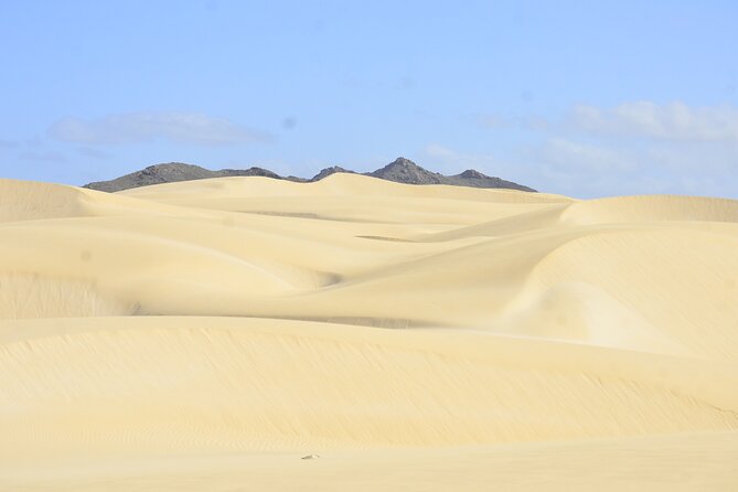 Half Day 4x4 Trip - Dunes, Caves, Santa Monica Beach & Village - Crossing the white sands of Viana Desert