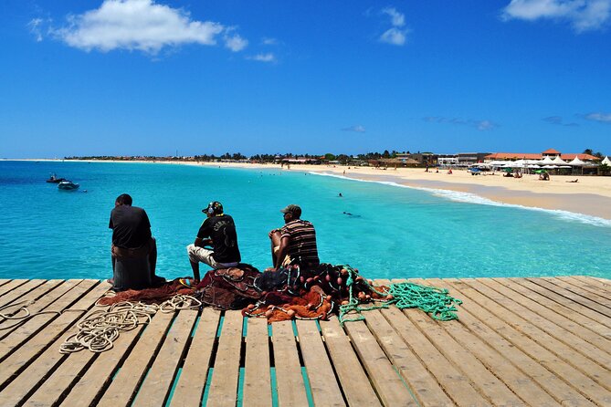 Sal island: Private Santa Maria City Tour, Street Art and Tapas - Old photographs, utensils, and a view over town